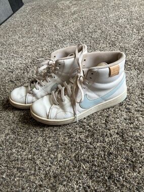 Nike Women's High-Top Sneakers in White with Light Blue Swoosh and Tan Accent